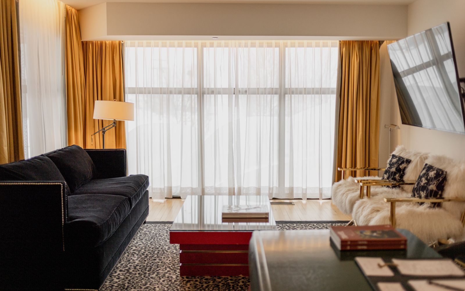 A Living Room With A Large Window