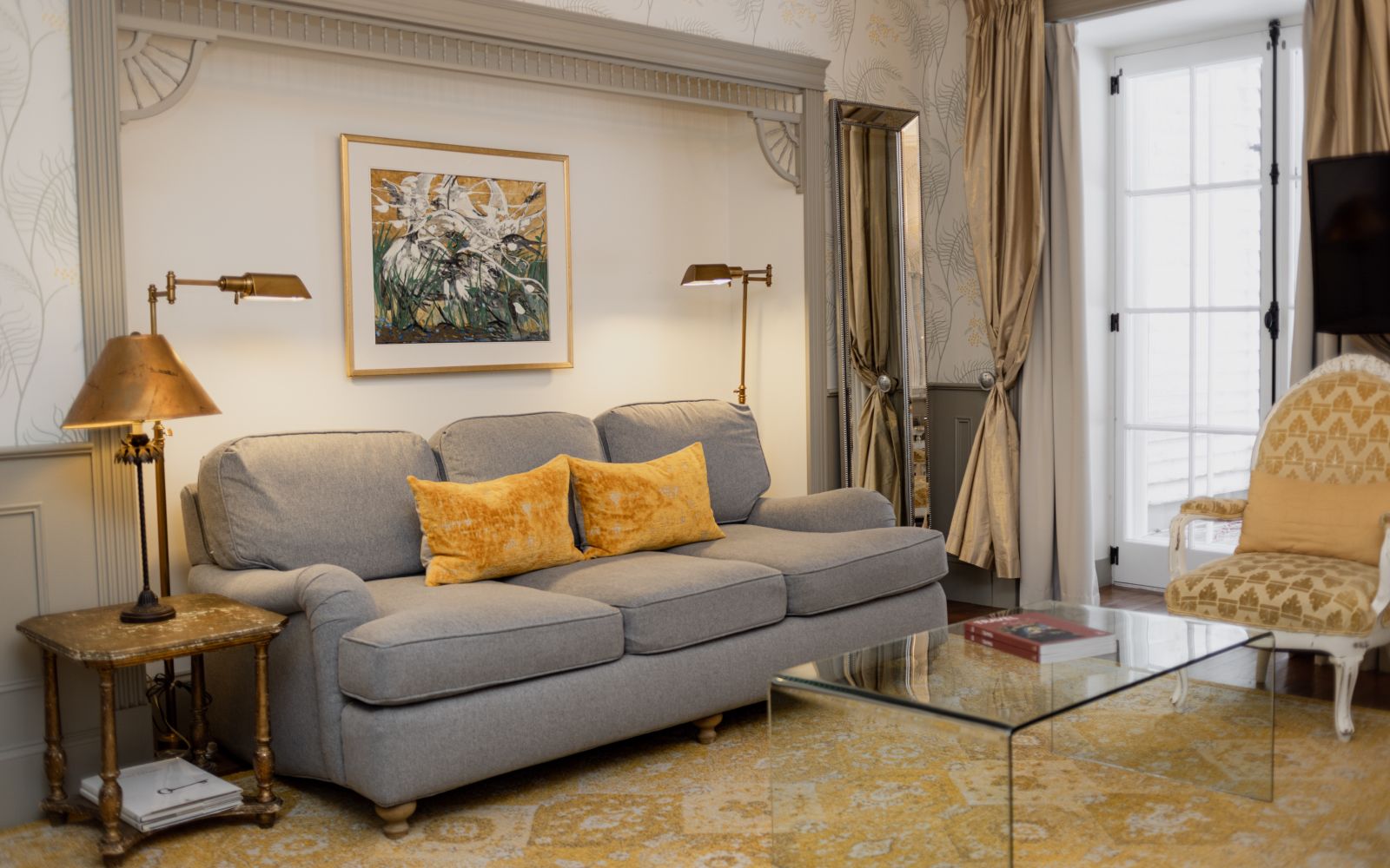 A Living Room With A Couch And A Coffee Table