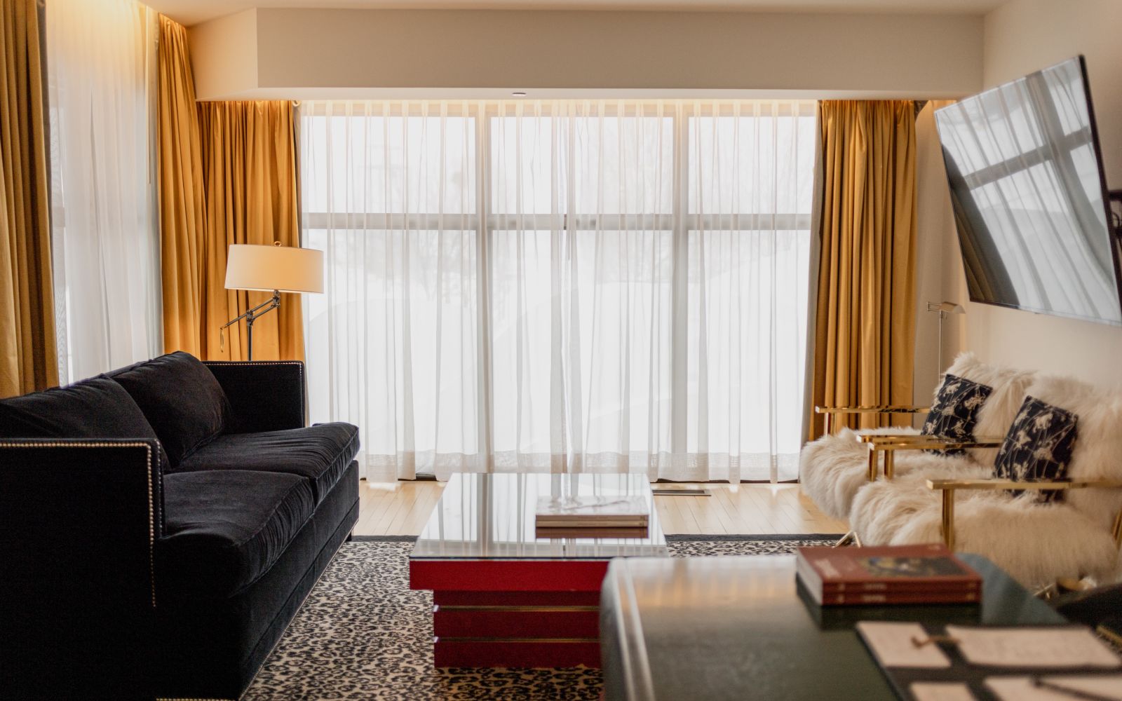 A Living Room With A Large Window